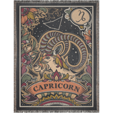 Decorative blanket with Capricorn zodiac design on a plain background